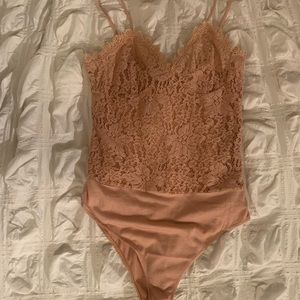 Peach body suit
